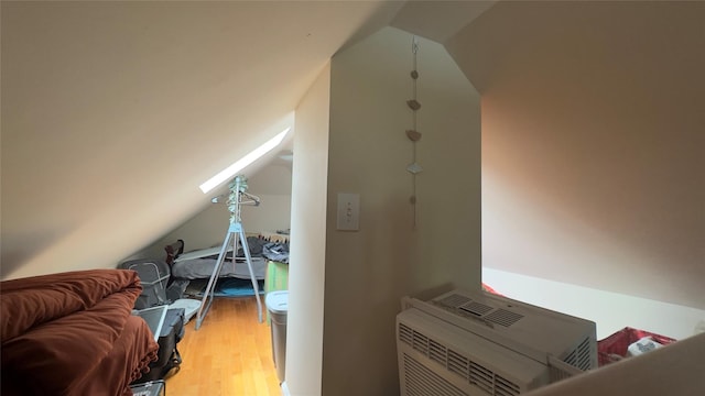 25 Center Ave, Bay Shore, NY 11706 - bonus room featuring vaulted ceiling and light wood finished floors