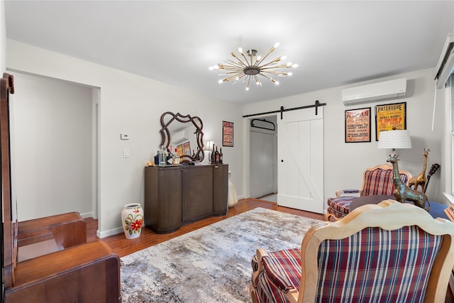 60 Hagerman Ave, East Patchogue, NY 11772 - bedroom featuring a wall unit AC, a barn door, wood finished floors, a chandelier, and baseboards