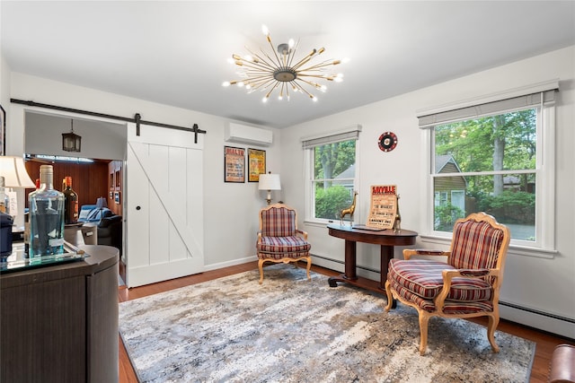 60 Hagerman Ave, East Patchogue, NY 11772 - living area featuring a wall mounted air conditioner, a barn door, a chandelier, and wood finished floors