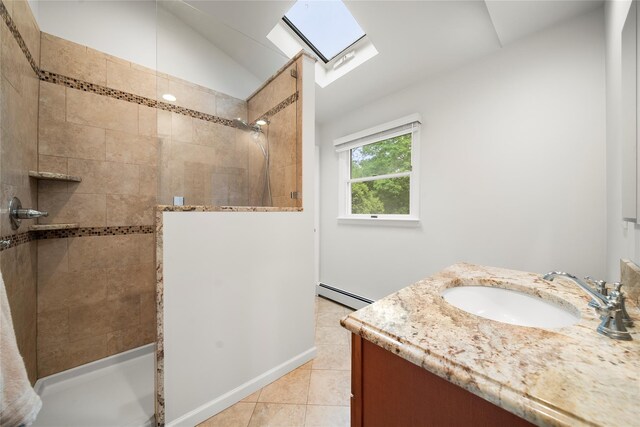 60 Hagerman Ave, East Patchogue, NY 11772 - full bathroom featuring baseboard heating, a skylight, walk in shower, vanity, and tile patterned flooring