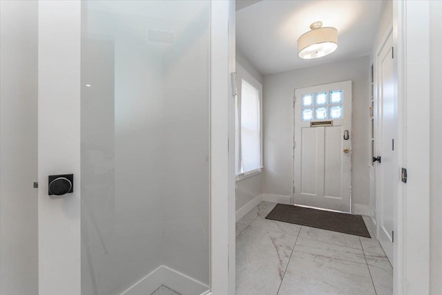 1064 Highland Pl, Woodmere, NY 11598 - entryway with light marble finish floors and baseboards