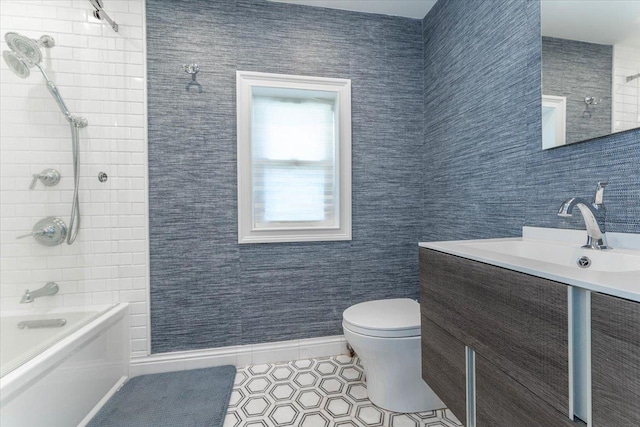 1064 Highland Pl, Woodmere, NY 11598 - bathroom with toilet, tile patterned flooring, shower / washtub combination, vanity, and baseboards