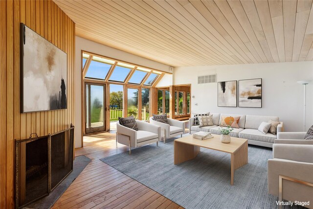 46 Tuthill Point Rd, East Moriches, NY 11940 - living area featuring wood ceiling, hardwood / wood-style flooring, and vaulted ceiling