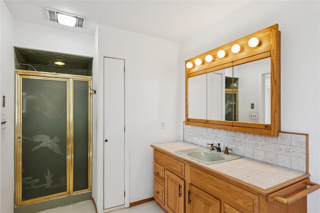 46 Tuthill Point Rd, East Moriches, NY 11940 - full bathroom with a stall shower, tasteful backsplash, and vanity