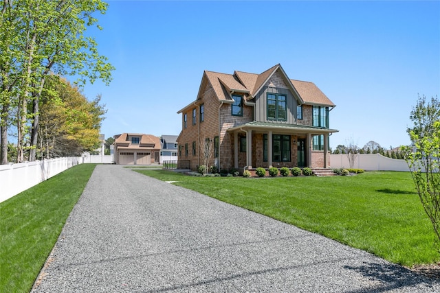 50 Depot Rd, Westhampton Beach, NY 11978 - shingle-style home featuring covered porch, a garage, and board and batten siding