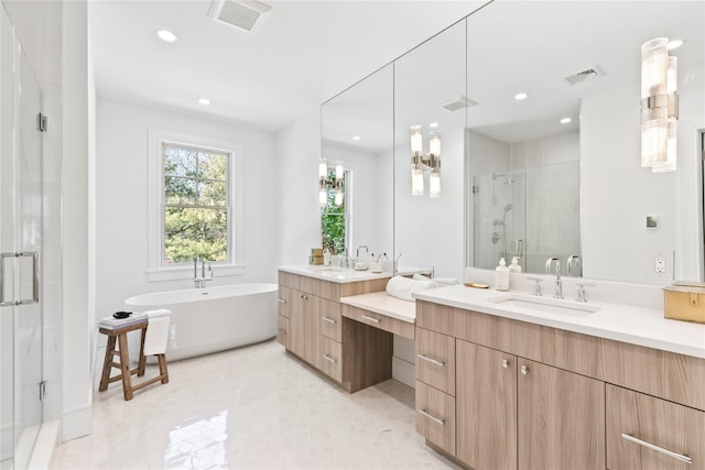 50 Depot Rd, Westhampton Beach, NY 11978 - full bath with a stall shower, two vanities, a freestanding bath, and recessed lighting