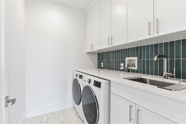 50 Depot Rd, Westhampton Beach, NY 11978 - washroom featuring cabinet space, baseboards, and washer and dryer