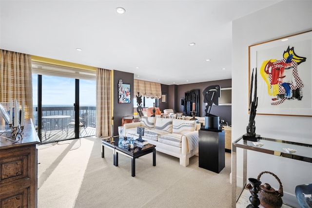 270-10 Grand Central Pkwy Unit 11V, Floral Park, NY 11005 - living room featuring light colored carpet, recessed lighting, and a water view