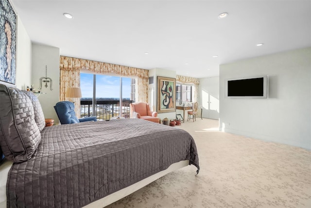 270-10 Grand Central Pkwy Unit 11V, Floral Park, NY 11005 - bedroom featuring multiple windows, carpet flooring, and recessed lighting