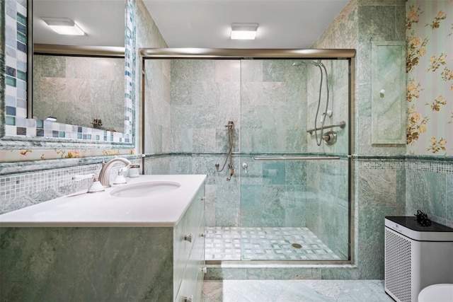 270-10 Grand Central Pkwy Unit 11V, Floral Park, NY 11005 - full bath with tile walls, vanity, and a shower stall