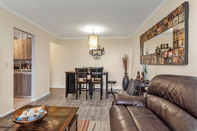 150-10 71st Ave Unit 6H, Kew Garden Hills, NY 11367 - living room with ornamental molding, wood finished floors, and baseboards