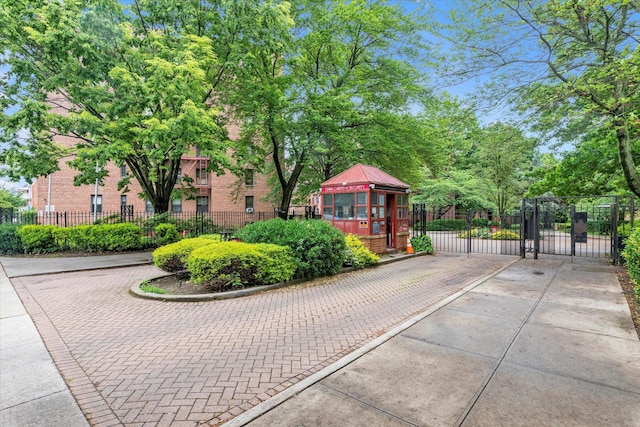 150-10 71st Ave Unit 6H, Kew Garden Hills, NY 11367 - view of property's community featuring a gate
