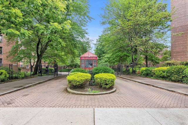 150-10 71st Ave Unit 6H, Kew Garden Hills, NY 11367 - view of community featuring a gate