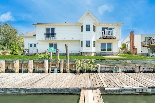 2874 Shore Rd, Seaford, NY 11783 - dock area featuring a balcony