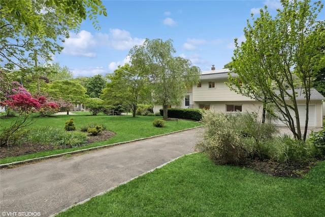 475 Lilac Ln, Cutchogue, NY 11935 - view of front of property featuring a front lawn and a chimney