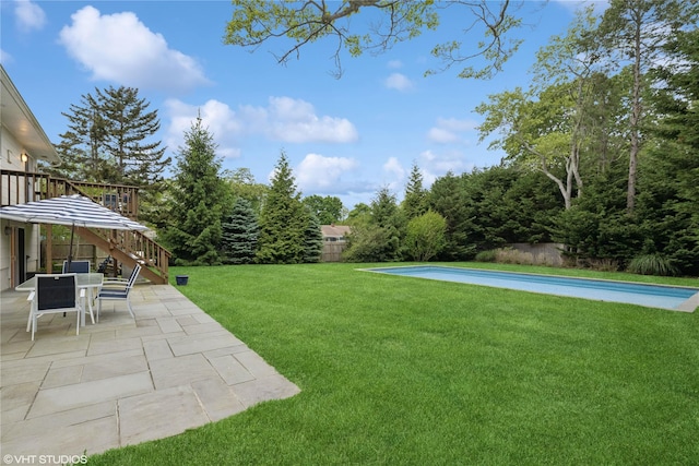475 Lilac Ln, Cutchogue, NY 11935 - view of grassy yard with a patio area, outdoor dining area, stairs, and a swimming pool