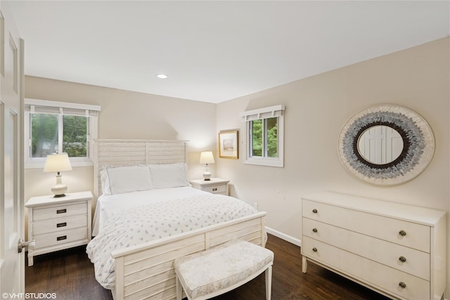 475 Lilac Ln, Cutchogue, NY 11935 - bedroom with multiple windows, dark wood-style flooring, and recessed lighting