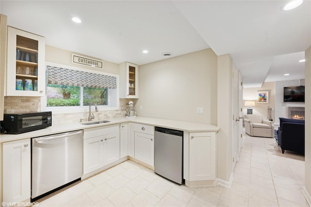 475 Lilac Ln, Cutchogue, NY 11935 - kitchen with stainless steel dishwasher, black microwave, tasteful backsplash, and recessed lighting