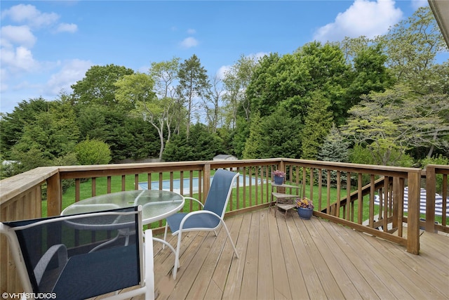 475 Lilac Ln, Cutchogue, NY 11935 - wooden terrace featuring outdoor dining area and a lawn
