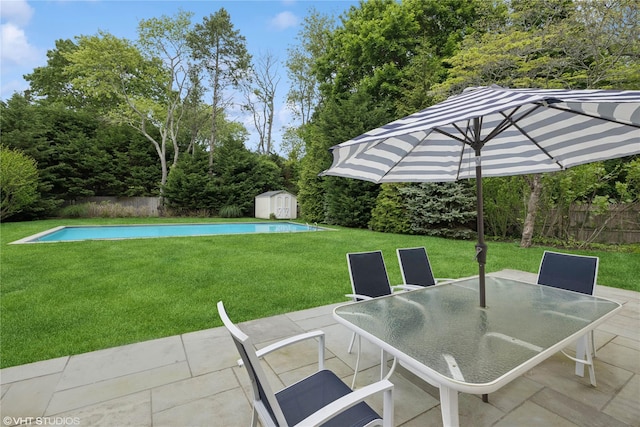 475 Lilac Ln, Cutchogue, NY 11935 - view of patio with a storage unit, outdoor dining space, and view of scattered trees