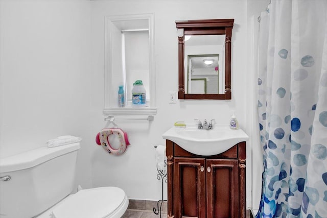 1230 Arnow Ave, Bronx, NY 10469 - bathroom with toilet, vanity, a shower with curtain, tile patterned floors, and baseboards