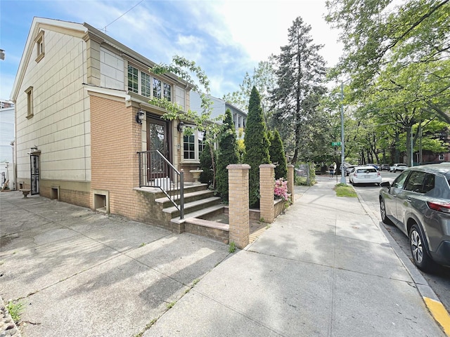 15204 79th Ave, Kew Garden Hills, NY 11367 - view of home's exterior with brick siding