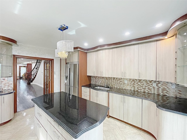 15204 79th Ave, Kew Garden Hills, NY 11367 - kitchen featuring stainless steel fridge with ice dispenser, a sink, tasteful backsplash, dark stone countertops, and recessed lighting