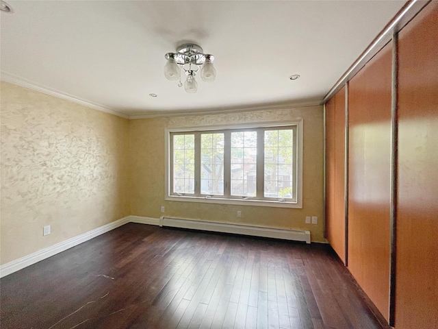 15204 79th Ave, Kew Garden Hills, NY 11367 - unfurnished room featuring baseboard heating, ornamental molding, dark wood-style floors, and baseboards