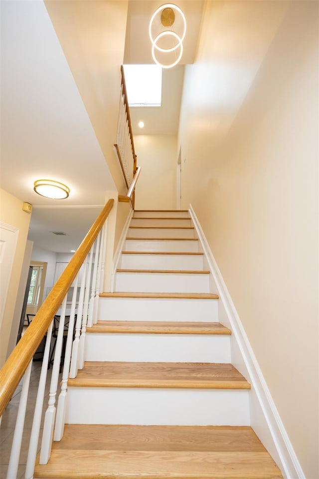 247 Marcus Ave, New Hyde Park, NY 11040 - staircase with wood finished floors
