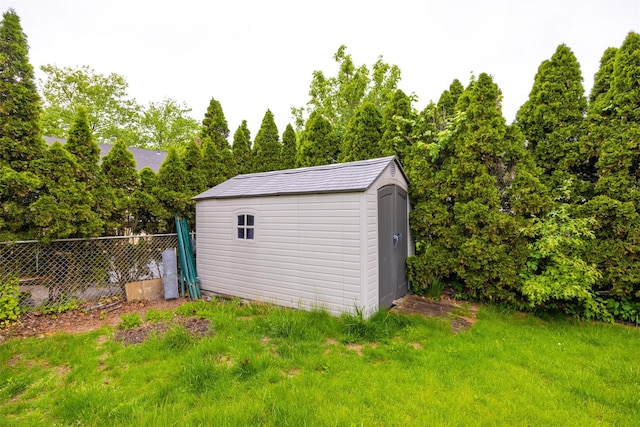 247 Marcus Ave, New Hyde Park, NY 11040 - view of shed featuring view of wooded area