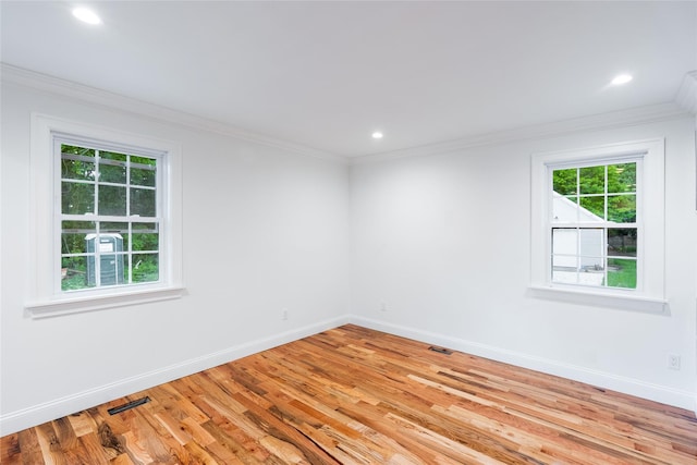 381 Wading River Rd, Manorville, NY 11949 - empty room with baseboards, light wood-type flooring, ornamental molding, and recessed lighting