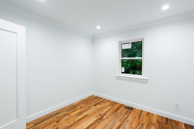 381 Wading River Rd, Manorville, NY 11949 - unfurnished room with light wood finished floors, baseboards, ornamental molding, and recessed lighting