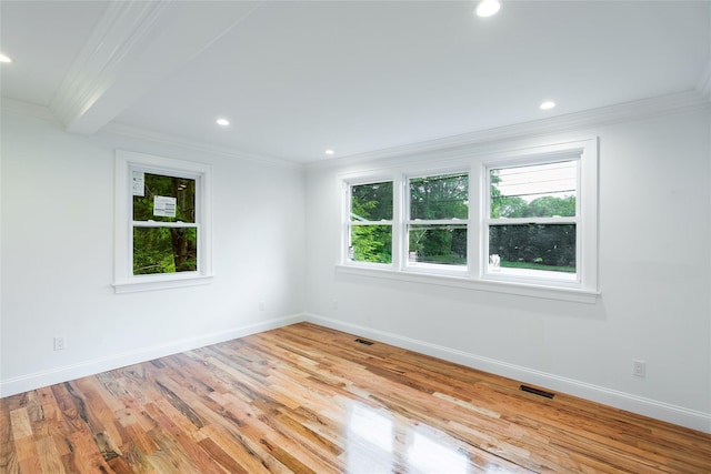 381 Wading River Rd, Manorville, NY 11949 - empty room with crown molding, baseboards, light wood-style flooring, recessed lighting, and beamed ceiling