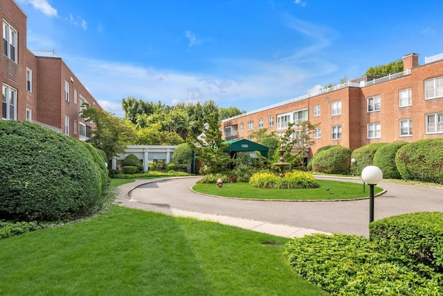 1390 Broadway Unit 107, Hewlett, NY 11557 - view of home's community featuring a yard