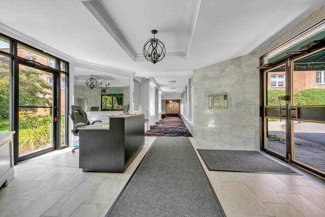 1390 Broadway Unit 107, Hewlett, NY 11557 - reception area with a chandelier, tile walls, and ornamental molding