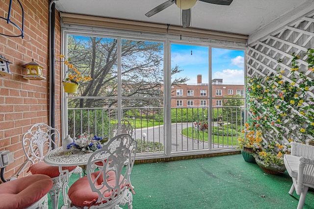 1390 Broadway Unit 107, Hewlett, NY 11557 - balcony featuring a ceiling fan