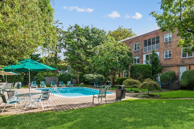 1390 Broadway Unit 107, Hewlett, NY 11557 - community pool featuring a patio