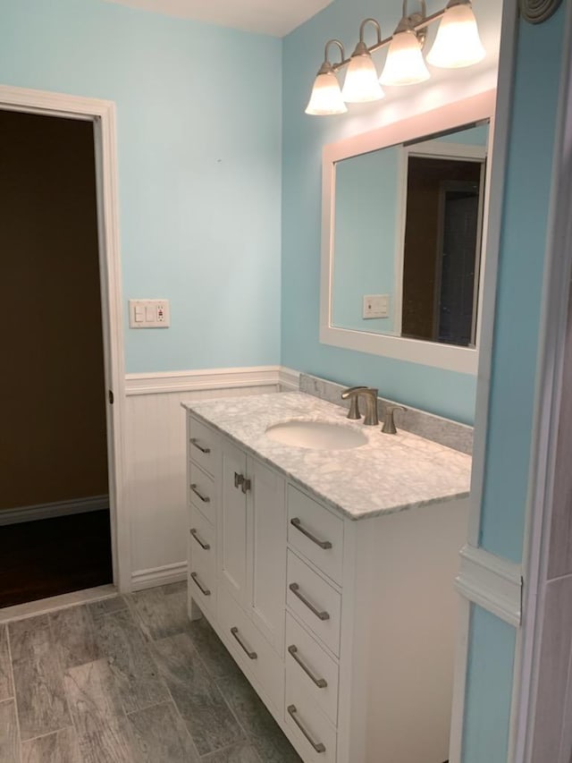 5-7 Barbara Ln, Farmingdale, NY 11735 - bathroom with wainscoting and vanity