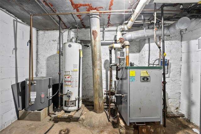 utilities with gas water heater and a heating unit