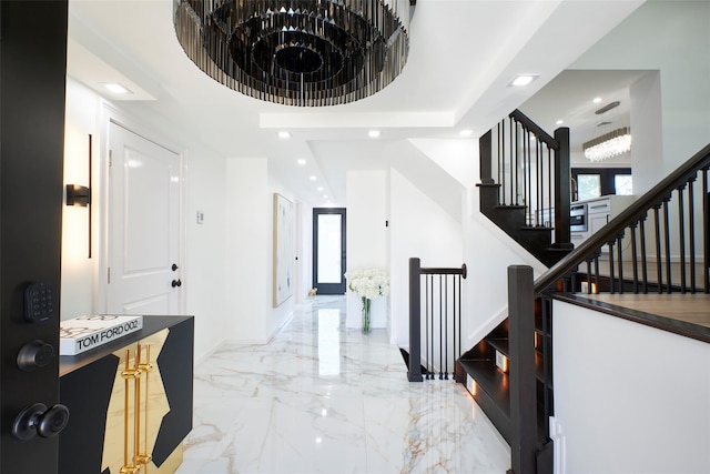 929 Jewel Dr, North Woodmere, NY 11581 - foyer entrance with marble tiled floors, stairway, recessed lighting, a towering ceiling, and baseboards