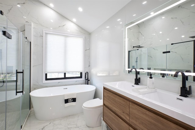 929 Jewel Dr, North Woodmere, NY 11581 - bathroom featuring marble tiled floors, a marble finish shower, vanity, vaulted ceiling, and a freestanding bath