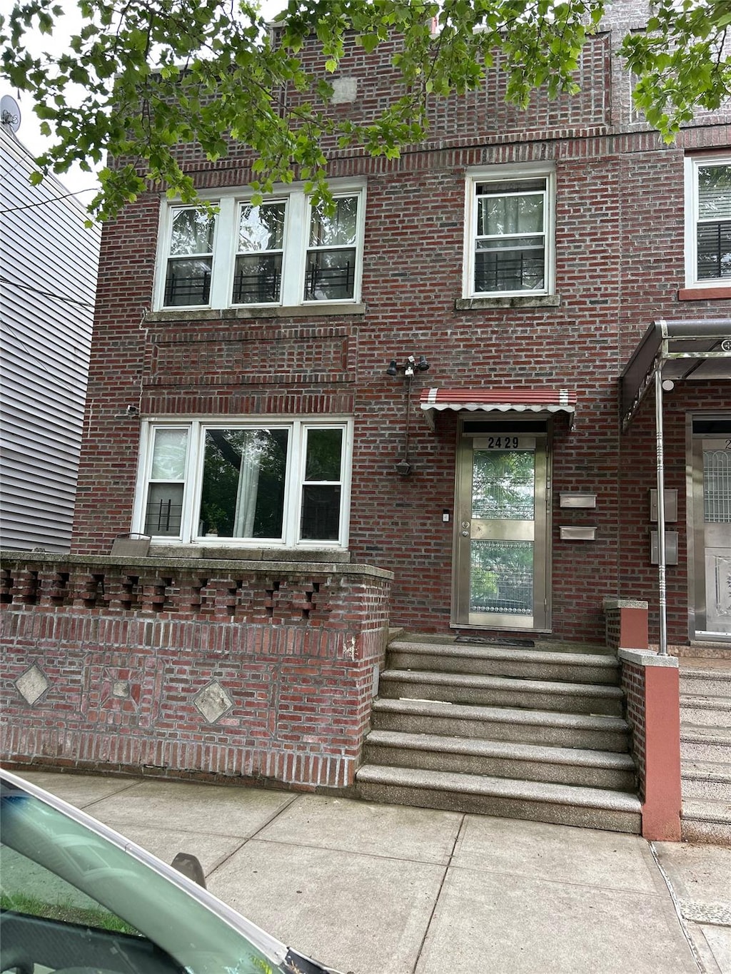 2429 Buck St, Bronx, NY 10461 - view of front of house featuring brick siding
