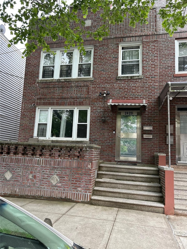 2429 Buck St, Bronx, NY 10461 - view of front of house featuring brick siding
