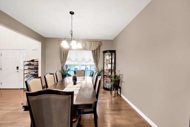 26 Kyleigh Way, Middletown, NY 10940 - dining space featuring a chandelier, wood finished floors, and baseboards