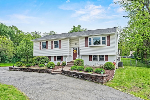 149 E Main St, Washingtonville, NY 10992 - split foyer home featuring cooling unit and driveway