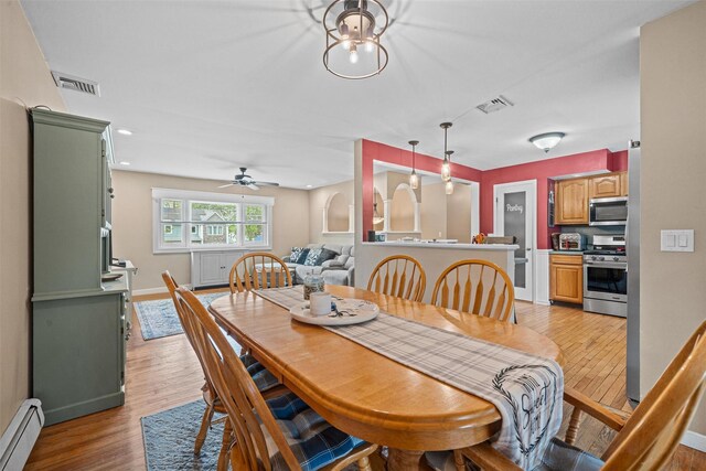 149 E Main St, Washingtonville, NY 10992 - dining area featuring a baseboard radiator, light wood-type flooring, a ceiling fan, baseboards, and recessed lighting