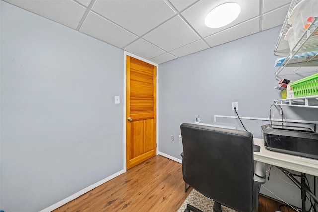 149 E Main St, Washingtonville, NY 10992 - home office with a drop ceiling, wood finished floors, and baseboards