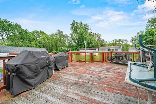149 E Main St, Washingtonville, NY 10992 - wooden terrace featuring a grill and view of scattered trees