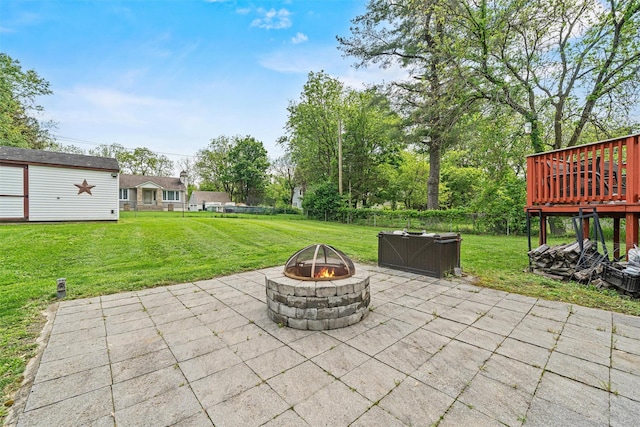 149 E Main St, Washingtonville, NY 10992 - view of patio / terrace featuring an outdoor fire pit, a wooden deck, and an outbuilding