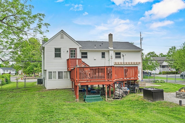 149 E Main St, Washingtonville, NY 10992 - rear view of property with a wooden deck, a fire pit, a chimney, central AC unit, and a gate
